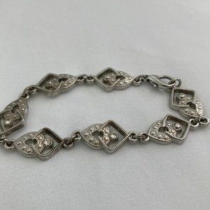 Fancy silver tone bracelet